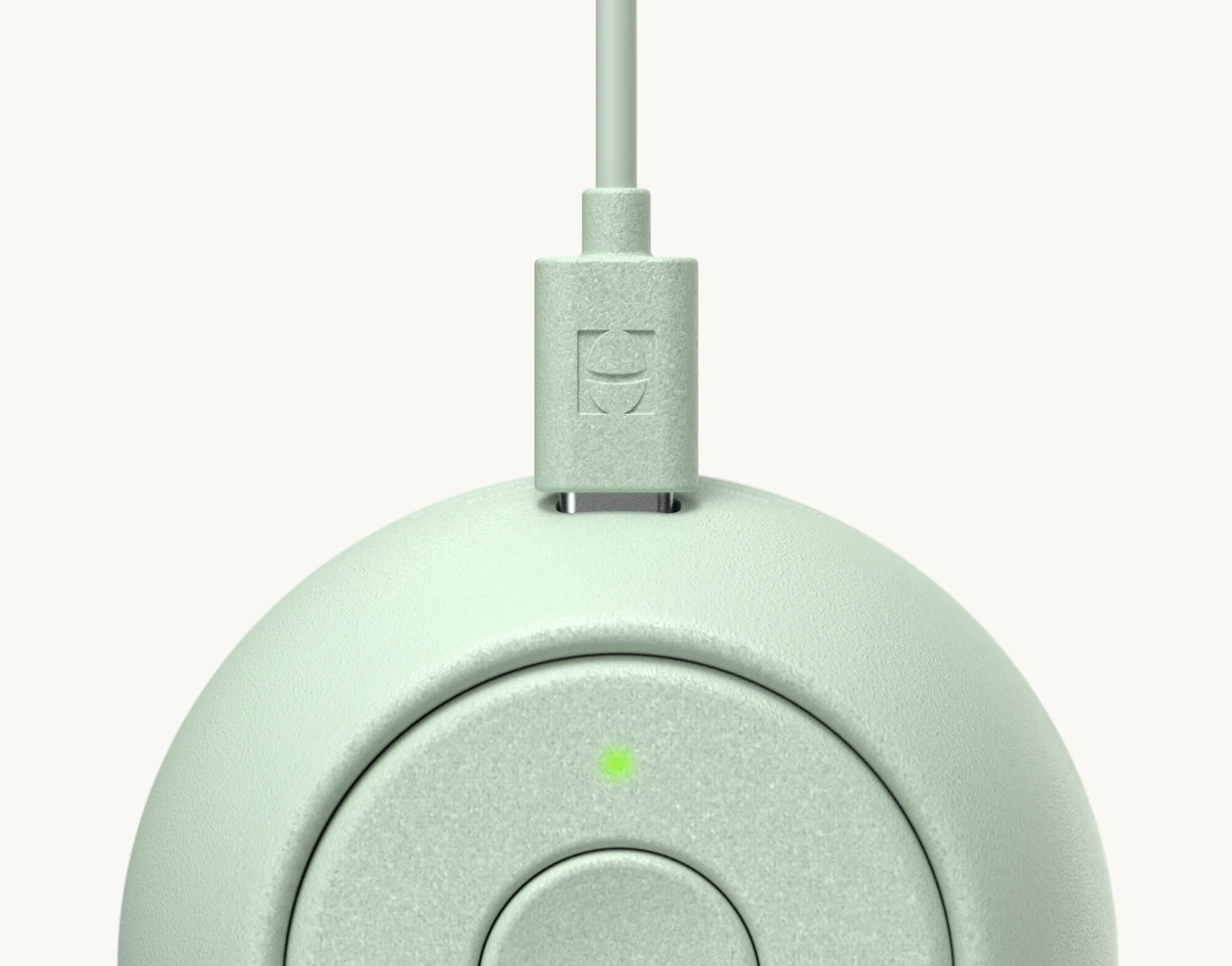 Hatch Go Mint with charger plugged in