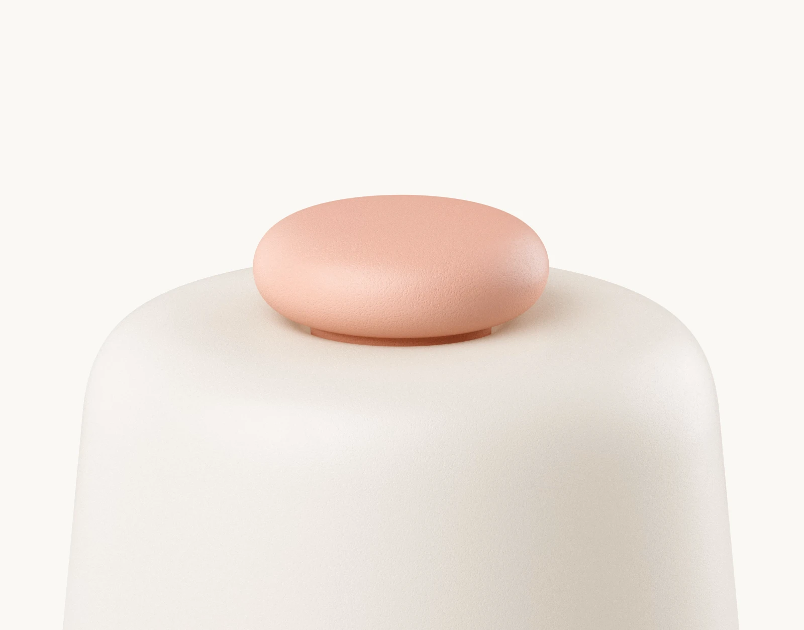 Closeup of top button on a Hatch Baby Peach