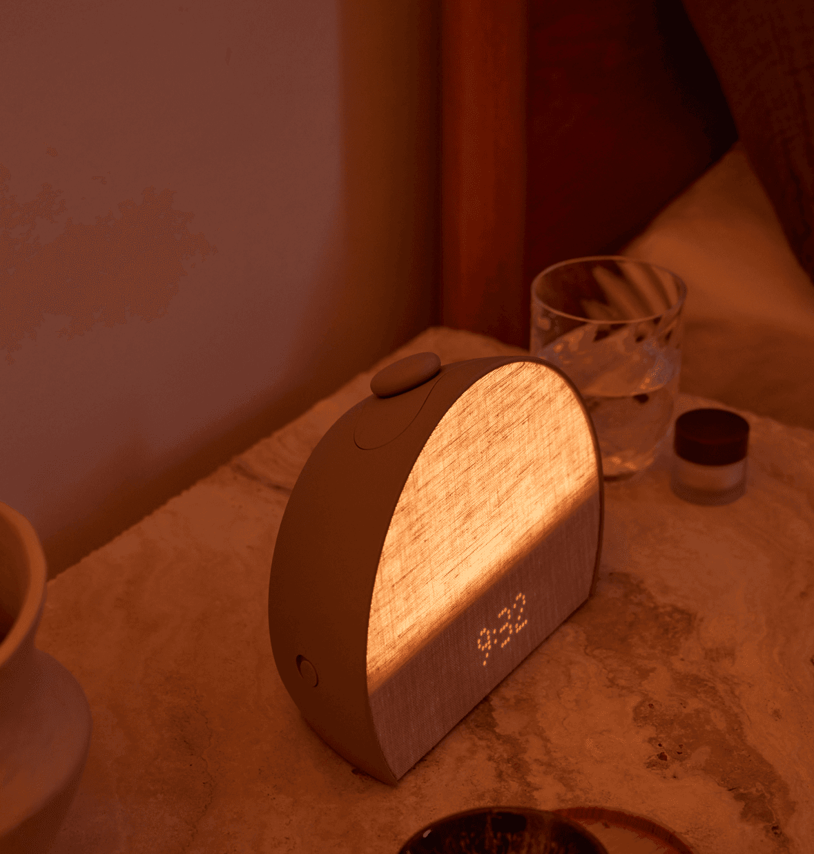 Hatch sleep clock greige on a nightstand